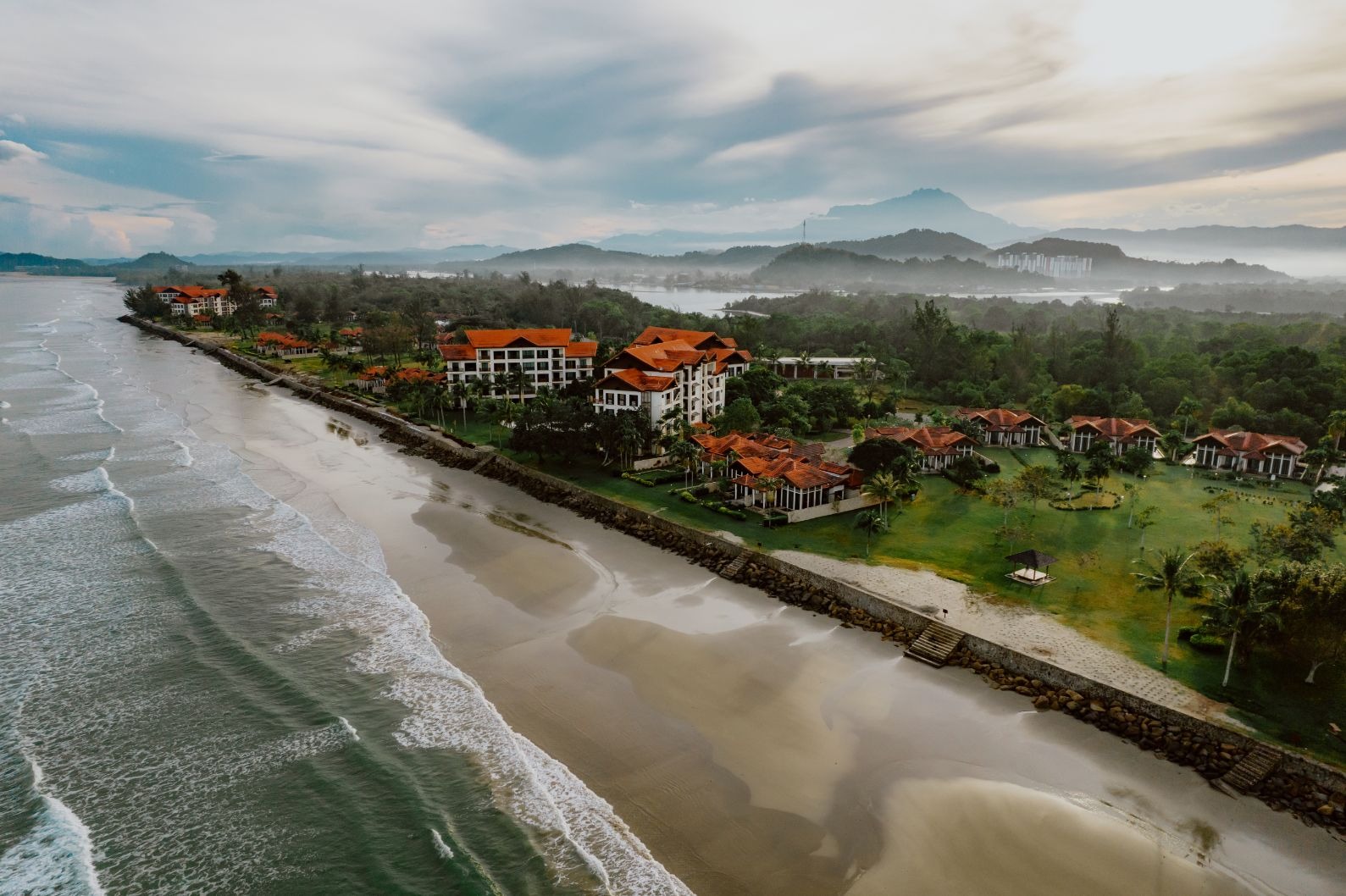 Villa terrace opening directly onto beach